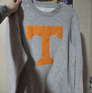 Gray Sweatshirt with Orange T Logo